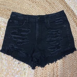 Black ripped shorts